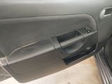 a close up of a car door handle with the door handle open