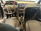 the interior of a car with a steering wheel and dashboard controls