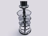 a glass candle holder with a candle on top of it