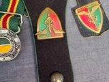 a belt with a medal and a medal on it