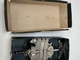 a box that has a pair of scissors in it