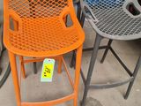 two chairs that are sitting next to each other