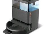 une image représentant un distributeur d'eau automatique noir pour animaux de compagnie sur fond blanc