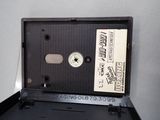 a black cassette sitting on top of a black box