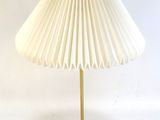 an image of a lamp with a white shade on it