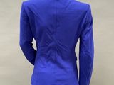 the back of a blue jacket on a mannequin mannequin mannequin mannequin mann