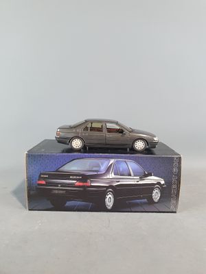 a toy car sitting on top of a box