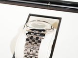 a watch that is sitting in a box on a table