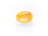 a yellow oplite gems on a white background