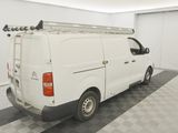 a white van that is parked in a garage
