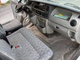 a car that is sitting in the back of the truck