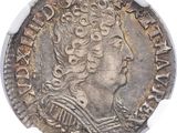 une pièce d'argent portant une tête de femme