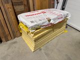 a stack of wood that has been wrapped up and ready to be used