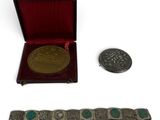 an image of a silver and turquoise bracelet and a silver coin