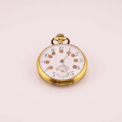 an image of a pocket watch on a white surface with a white background