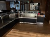 an image of a kitchen with a counter and a counter top