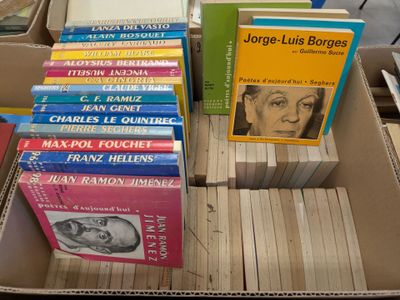 a lot of books in a box on a table