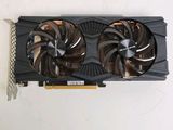 a close up of a video card with two fans on it