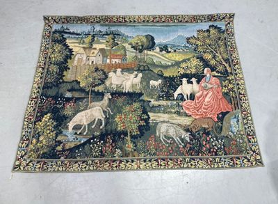 a tapestry with a picture of a woman and animals on it