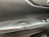 a car door handle with a hole in it