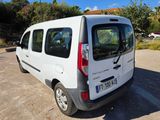 a white van that is parked in a parking lot