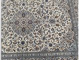 a close up of a rug on a white surface with a white background