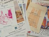 many different types of posters on the table