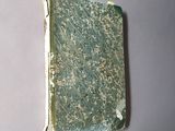 a book that has a green cover on it