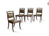 set of four dining chairs with leather upholstered seats