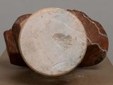 a close up of a piece of wood with a piece of wood on it