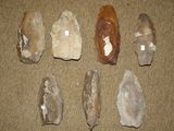 five different types of rocks on the floor