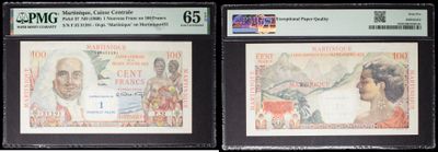 three different types of currency are on display in a display case
