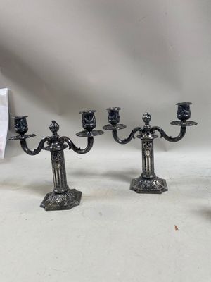 three candles that are sitting on a table