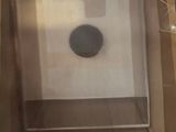 a picture of a box with a black object inside of it