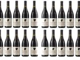 a bunch of bottles of wine sitting on top of each other