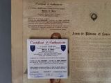 a certificate on a piece of paper with a picture of a woman