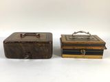 two wooden boxes with handles and handles sitting side by side