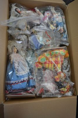 a cardboard box filled with stuffed animals in it