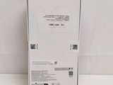 the back of a white box with a black and white label on it