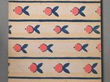 a close up of a notebook with an orange and blue pattern on it