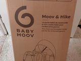 une boîte en carton sur laquelle figure l'image d'un bébé dans une poussette