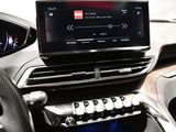 a car dashboard with a digital display in the center