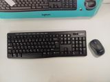 a keyboard and a mouse on a desk