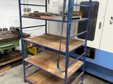 a picture of a machine shop with shelves and a machine