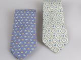 pair of two neck ties on a white background