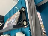 three lights that are on a shelf in a room