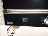 an image of a black stove top oven in a kitchen