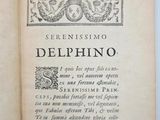 an open book with a black and white drawing on it