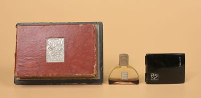 a small box with a small bottle of perfume and a small box with a small bottle of perfume