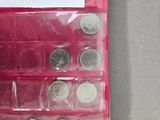 a picture of a display case with coins in it